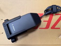 Držiak nabíjačky ebiku.