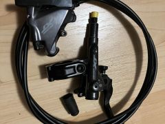 Zadní brzda Shimano XT Br-M8110 (flatmount)