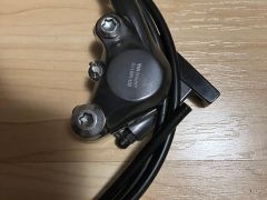 Zadní brzda Shimano XT Br-M8110 (flatmount)