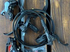 Nove brzdy shimano XT vpredu 4-piest vzadu 2-piest