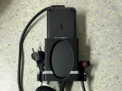 Držiak nabíjačky ebiku.