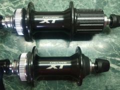 Naboje Shimano Hb-M8000 a Shimano Fh-M8000