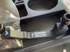 Shimano adaptér Sm-Ma-R180P/S pre 180 mm kotúč, zadná brzda (Post Mount)