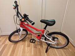 Rezervované - Na predaj detský bicykel Woom 3 - červený