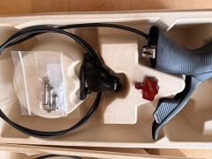 Řadicí a brzdové páky Sram Rival eTap AXS D1 1x12 + třmen Rival Flat