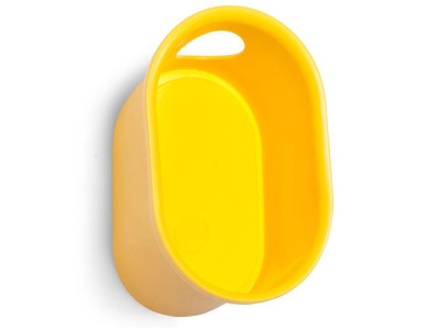 Cycloc Loop accessory holder on the wall, yellow